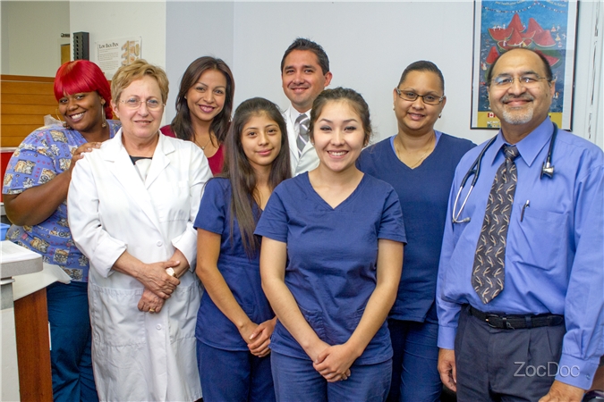 The staff of Medico Family Clinic with Dr. Zia